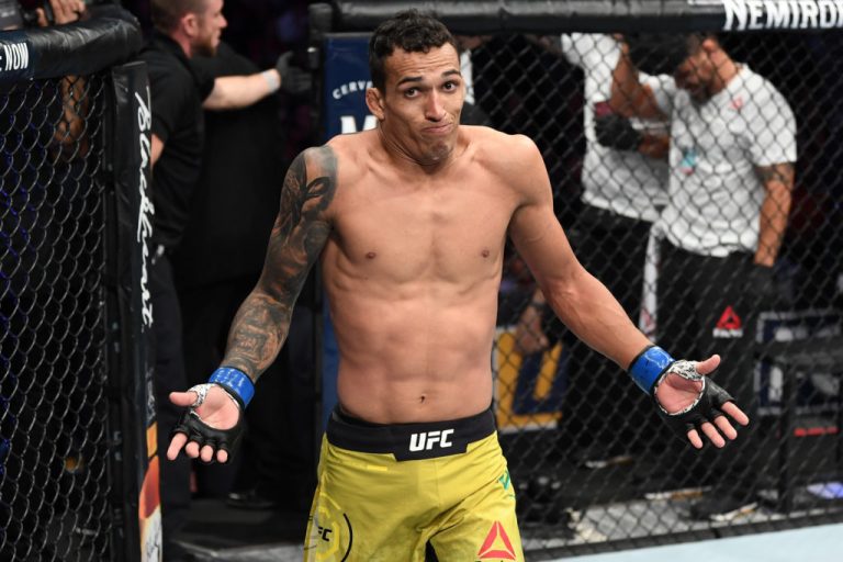 MILWAUKEE, WISCONSIN - DECEMBER 15:  Charles Oliveira of Brazil reacts to his submission victory over Jim Miller in their lightweight bout during the UFC Fight Night event at Fiserv Forum on December 15, 2018 in Milwaukee, Wisconsin. (Photo by Jeff Bottari/Zuffa LLC/Zuffa LLC via Getty Images)