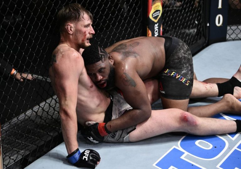 LAS VEGAS, NEVADA - JUNE 20: (R-L) Curtis Blaydes takes down Alexander Volkov of Russia in their heavyweight bout during the UFC Fight Night event  at UFC APEX on June 20, 2020 in Las Vegas, Nevada. (Photo by Chris Unger/Zuffa LLC)